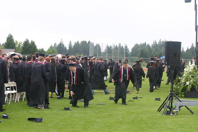 Graduates Retrieving Caps 1